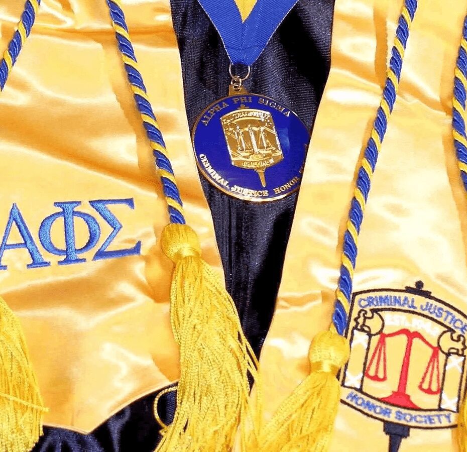 Honor society stole and medal with tassels.