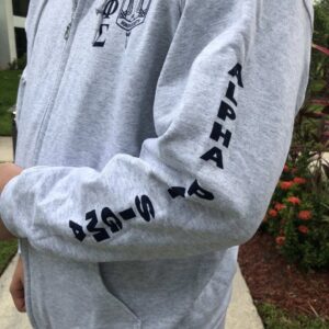 Person wearing Alpha Phi Alpha jacket.