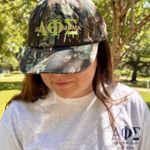 Woman wearing Alpha Phi Sigma gear