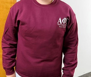 Maroon sweatshirt with white Greek letters