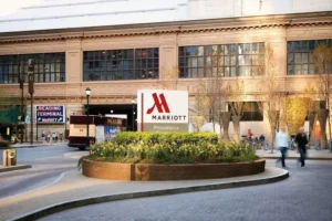 Marriott sign amid urban plaza planters